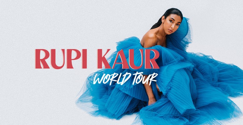 Photo of Rupi Kaur wearing a blue evening gown | AEG Presents RUPI KAUR: WORLD TOUR | Thursday, May 26, 2022, 8:00pm | Newmark Theatre