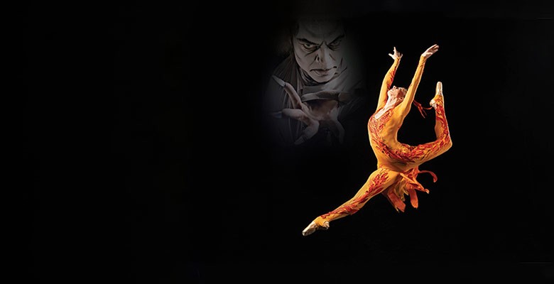 Photo of Jessica Lind dancing in firebird costume, jumping in air, by Jingzi Zhao