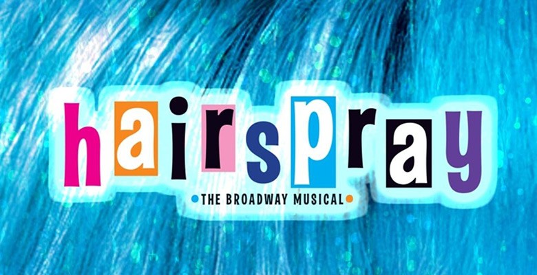 Hairspray title art image if stylized text on background of blue hair