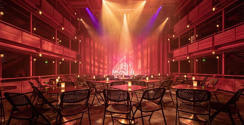 Winningstad Theatre interior (cabaret table seating setup) - view from back of seating area looking at stage