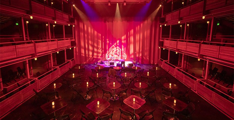 Winningstad Theatre interior (cabaret table seating setup) - view from back of Tier 2 seating area looking at stage