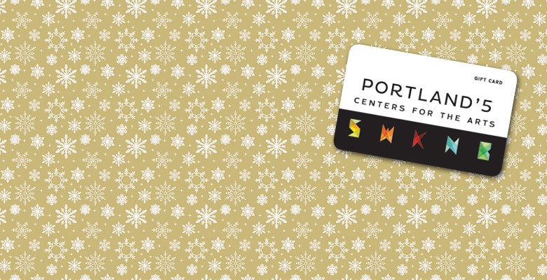 Portland'5 Gift Cards (image of gift card on snowflake gift wrap pattern) - Available online and at the Portland'5 Box Office