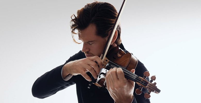 Photo of Blake Pouliot playing violin