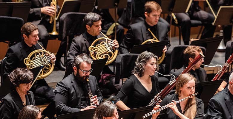 Photo of Oregon Symphony musicians performing.