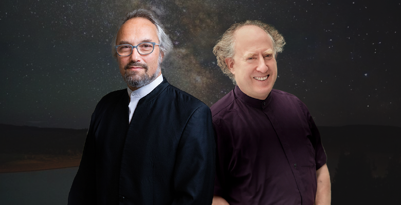 carlos kalmar and jeffrey kahane standing back to back in front of grey backdrop