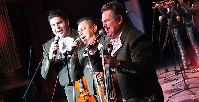 Photo of Jesus Guzman and two other members of Mariachi Los Camperos performing