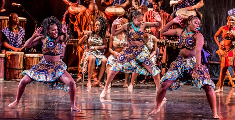 Photo of Sebé Kan Youth African Dance performing on stage