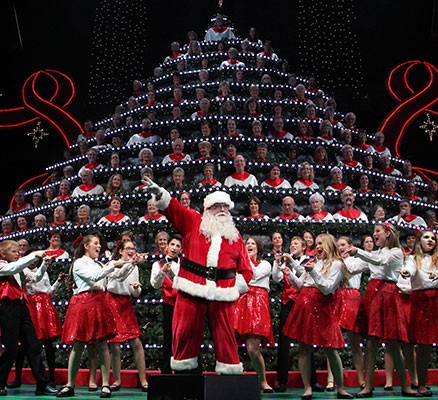 Photo of Portland's Singing Christmas Tree choir with Santa