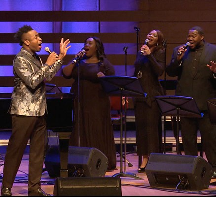 We Shall Overcome image - Photo of Damien Sneed and choir singing