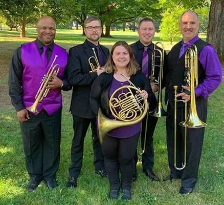 Portlandia Brass Ensemble photo of members with instruments