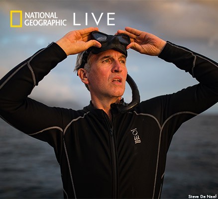 Photo: Brian Skerry in water wearing wet suit