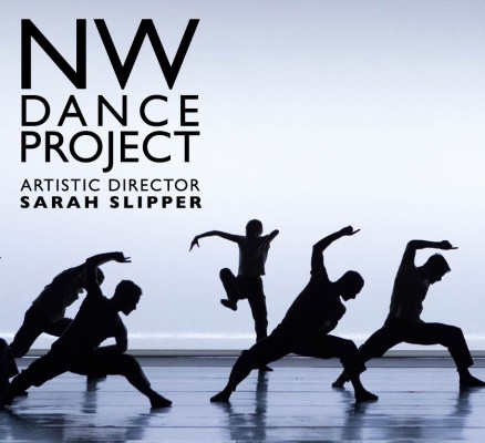 NW Dance Project photo of dancers performing on stage (silhouette)