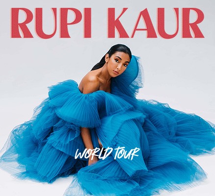 Photo of Rupi Kaur wearing blue dress | Text: Rupi Kaur World Tour