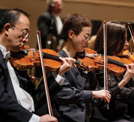 Photo of Oregon Symphony string players performing