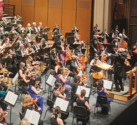 Photo of Oregon Symphony musicians performing.