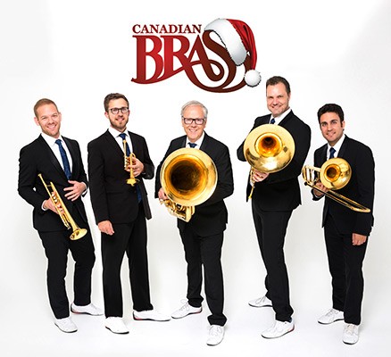 Photo of Canadian Brass members in suits holding their instruments