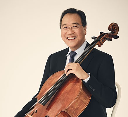 Photo of Yo Yo Ma smiling, holding cello