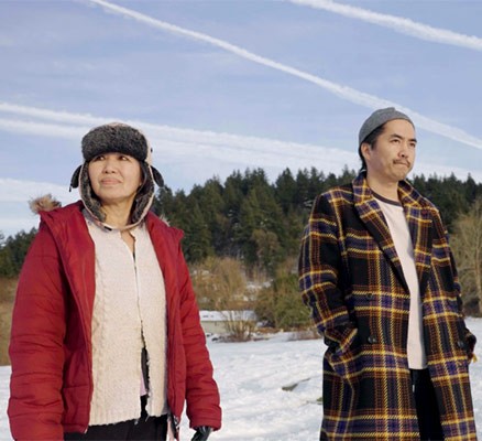 Still image from Mai American film of Kevin Truong (right) and his mother (left)
