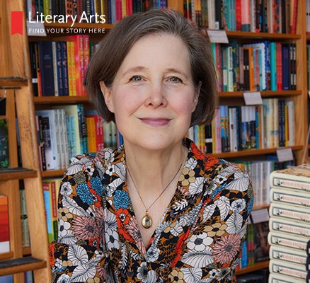 Photo of Ann Patchett with shelves of books in background