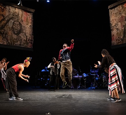 Photo of Camille A. Brown dancers performing on stage