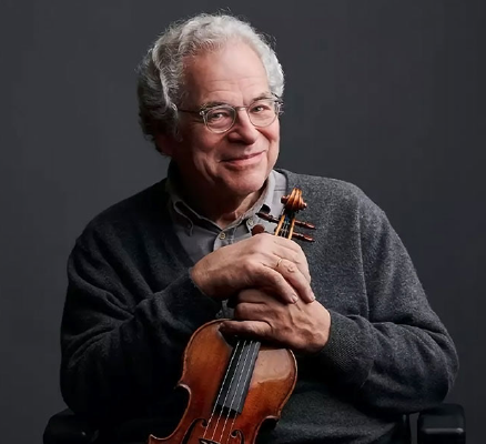 itzak perlman holding violin looking forward in front of black backdrop