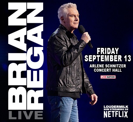 Photo of Brian Regan performing, holding microphone plus title text