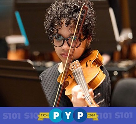 Photo of PYP student playing violin