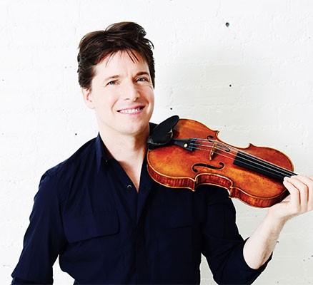 Photo of Joshua Bell holding violin on his shoulder