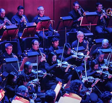 Photo of symphony orchestra performing