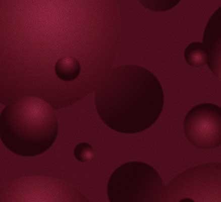 Image of maroon 3-D sphere shapes