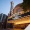 Photo of the Arlene Schnitzer Concert Hall marquee and Portland sign lit up