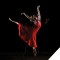 Photo of dancer wearing red dress in pose with black background