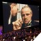 Photo of The Godfather on playing on screen with orchestra playing below