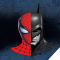 half spiderman half batman mask in font of blue backdrop