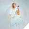 Photo of Lindsey Stirling holding violin